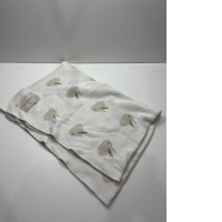 Beige towel with rabbits print