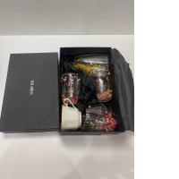 Set of 4 clear cups and teacup