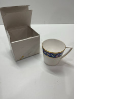 White teacup with pattern