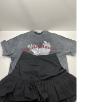 Girl's set: grey t-shirt and black skirt Girl's set: grey t-shirt and black skirt