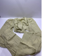 Women's beige evening suit: top and pants Women's beige evening suit: top and pants