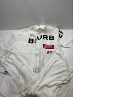 White boy's suit: shortsleeved shirt and pants