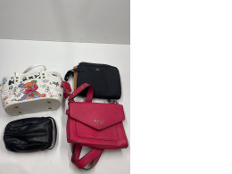 Set of 4 secondhand women's handbags
