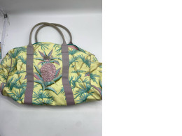 Yellow green travel bag with pineapple print