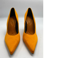 Orange hilled shoes Orange hilled shoes