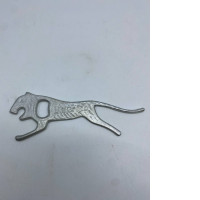 Iron bottle opener in the shape of a cat Iron bottle opener in the shape of a cat