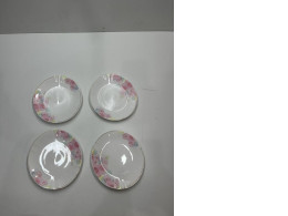 Set of white saucers