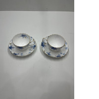 Set of 2 teacups with saucer