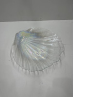 Saucer in the shape of a shell