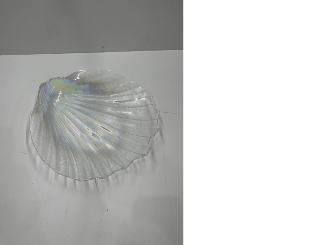 Saucer in the shape of a shell Saucer in the shape of a shell