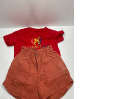 Bright red women's suit: t-shirt and shorts Bright red women's suit: t-shirt and shorts