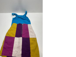 Gitl's summer suit: blue t-shirt and colorful skirt