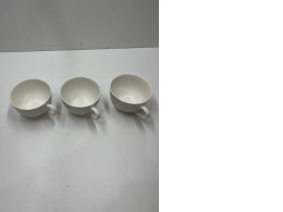 Set of white teacups