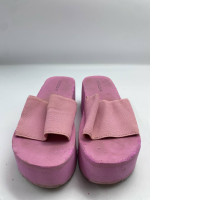 Pink platformed slippers