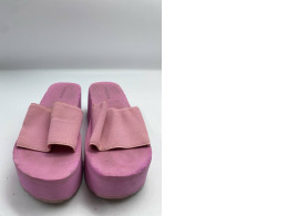 Pink platformed slippers