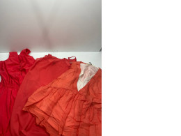 Set of bright red dresses