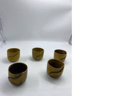 Set of brown teacups for Chineese tea ceremony Set of brown teacups for Chineese tea ceremony