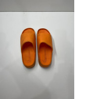 USED Nike orange slippers