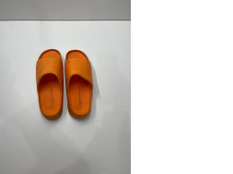 USED Nike orange slippers