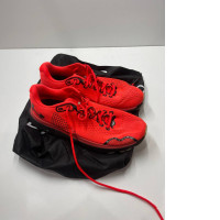 Bright orange running shoes