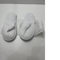 White hotel slippers