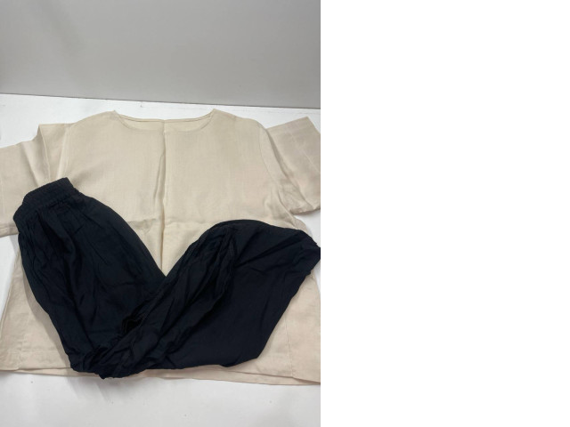 Kid's casual set: beige t-shirt and black pants Kid's casual set: beige t-shirt and black pants