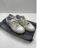 White secondhand sneakers White secondhand sneakers