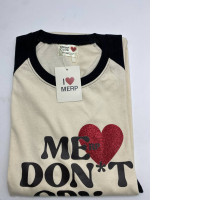 Cream colored round neck t-shirt with pattern Cream colored round neck t-shirt with pattern