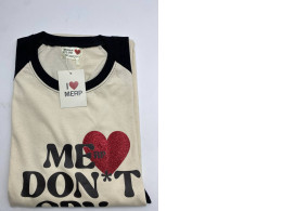 Cream colored round neck t-shirt with pattern Cream colored round neck t-shirt with pattern