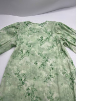 Green girl's dress with pattern