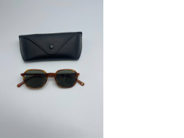Dark brown sunglasses with case