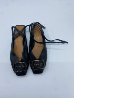 Black high heels and ankle strap Black high heels and ankle strap