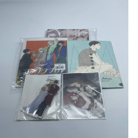 Set of 3 mini books, 1 postcard and 1 acrilyc stand 