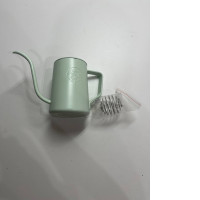 Light green Starbucks watering can