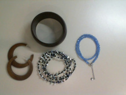 Set of 4 jewelry, 3 bracelets and 1 earring Set of 4 jewelry, 3 bracelets and 1 earring