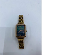 Gold ladies watch