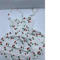 Women's tank top and white skirt with cherry pattern