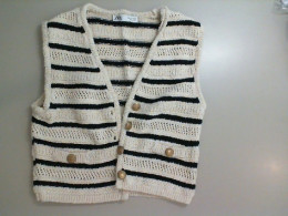 Knitted vest with buttons