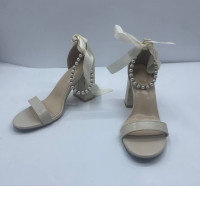 USED beige hilled shoes