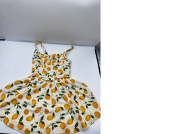 White tank top and short skirt dress with orange pattern