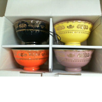 Set of 4 ceramic mugs. multi-colored