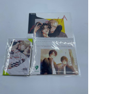 Set of 2 anime calendars and 1 manga book