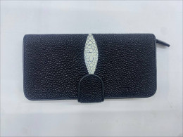 Black faux leather handbag