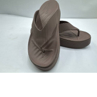 Cream-colored flip-flops