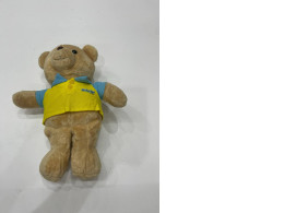 Bear in yellow t-shirt soft toy