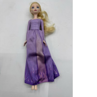 Doll toy in dress