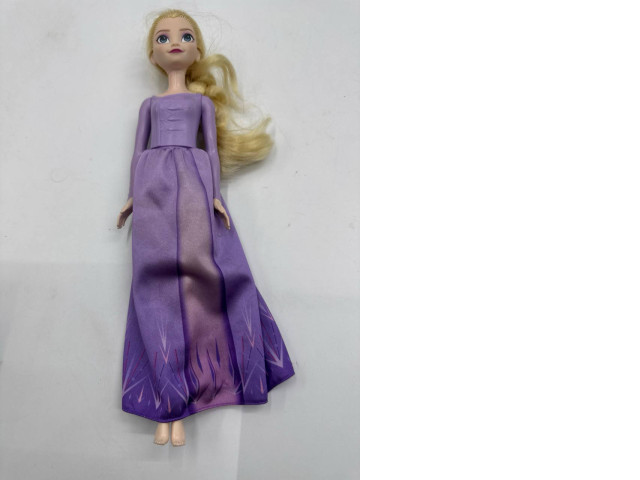 Doll toy in dress Doll toy in dress