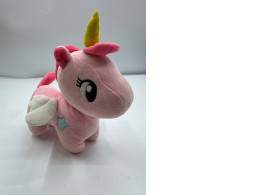 Pink unicorn soft toy