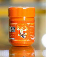 Hanuman brand herbal inhaler, orange color