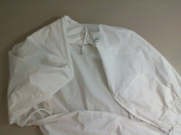 White sleeveless zip up jacket White sleeveless zip up jacket